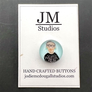 Murrine glass studio button of Ruth Bader Ginsburg by Jodie McDougall.