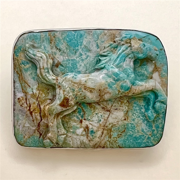 FANTASTIC carved turquoise button of a horse.