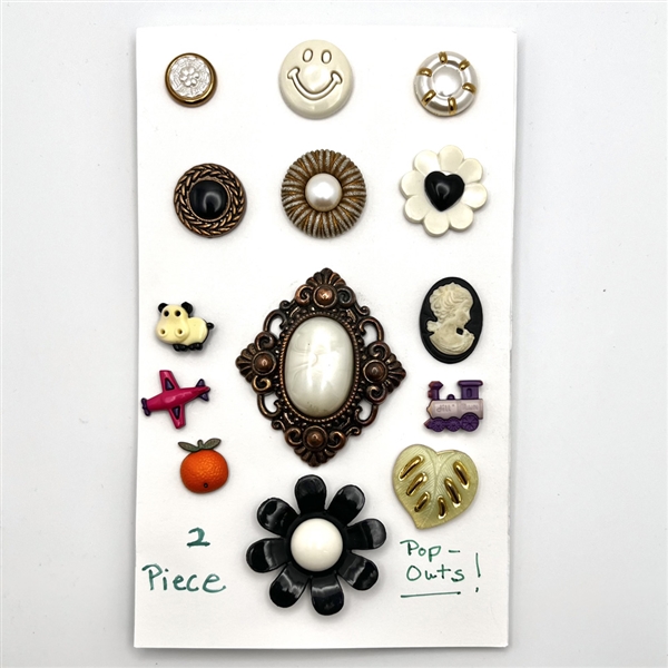 Card of fourteen snap-together buttons.