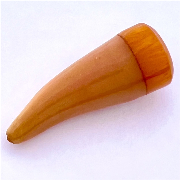 Celluloid button of a powder horn with Bakelite.