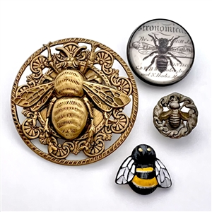 Four assorted buttons of bees.