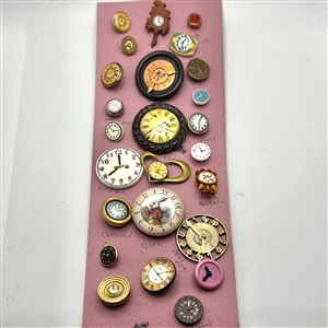 Card of twenty six clock buttons.