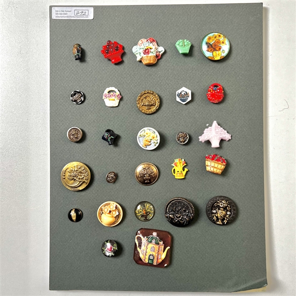 Card of twenty seven container buttons.