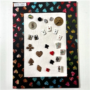 Card of twenty four playing card theme buttons.