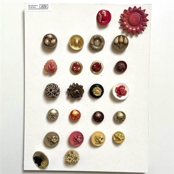 Card of twenty four celluloid buttons.