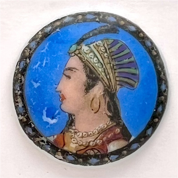 Liverpool transfer button of an Indian woman in a headdress.