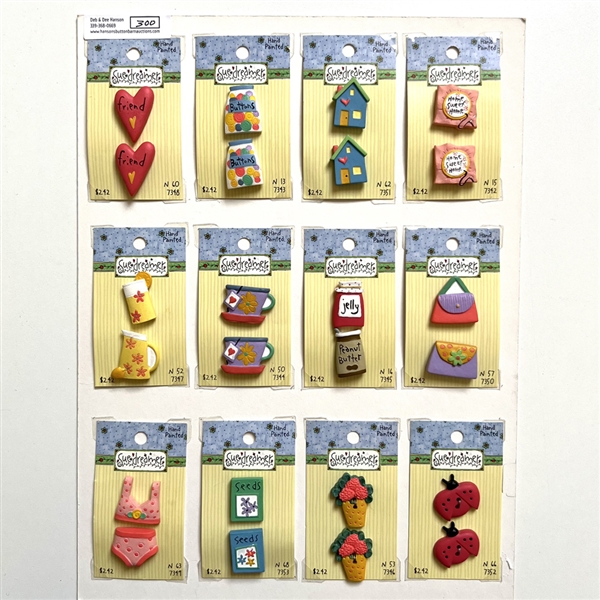 Twelve original cards of Sue Dreamer hand painted buttons.