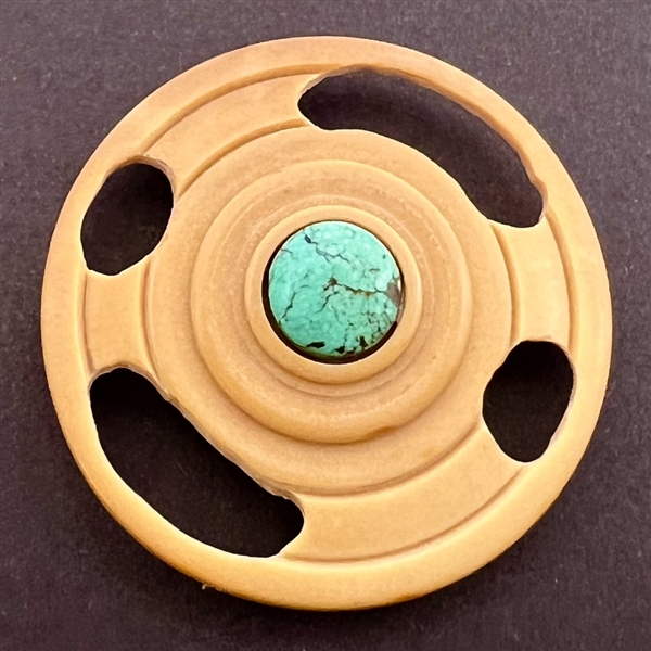 Studio button with turquoise center by Bob Benson. 