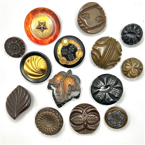 Fourteen Vintage Bakelite and catalin coat buttons.