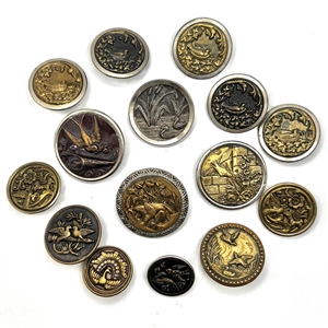 Fifteen metal buttons depicting birds.