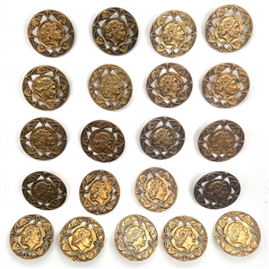 Set of twenty one brass buttons with openwork.