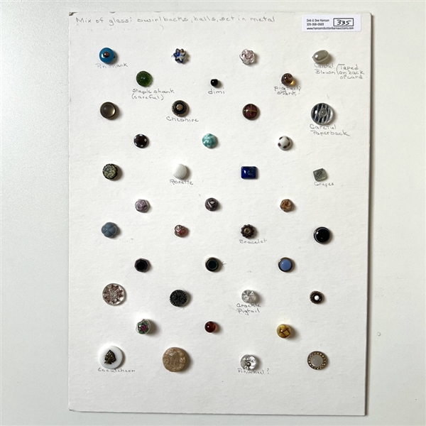 Card of 39 small and diminutive size assorted glass buttons.