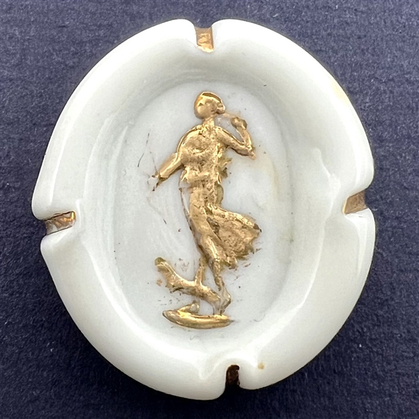 Bimini white glass button of a standing woman.