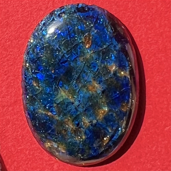 Large oval Popper blue glass button.