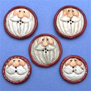 Five wood Santa Claus buttons. 