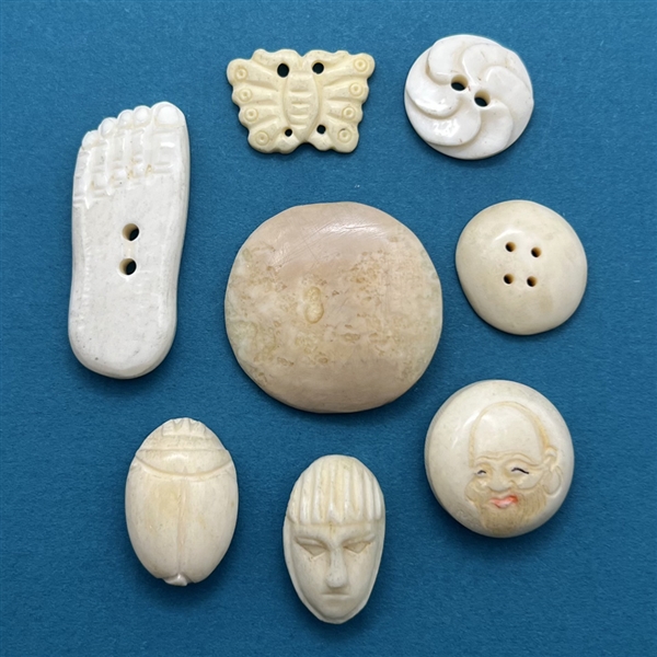 Eight buttons made from bone etc...