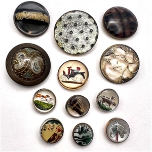 Group of 12 glass in metal buttons.