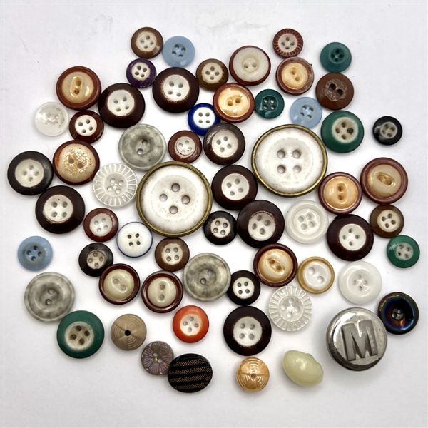 Group of 61 assorted china buttons and one stud from Briare France and beyond.