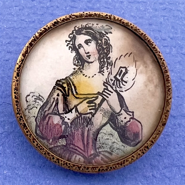 A 19th c. Painting on paper under glass button of a French woman.