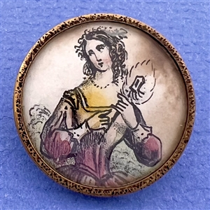 A 19th c. Painting on paper under glass button of a French woman.