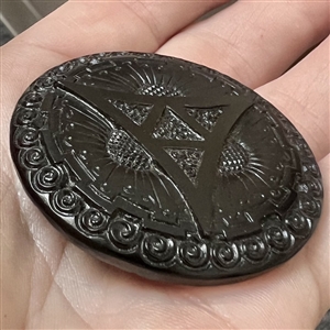 Extra large black glass button with Art Deco design.