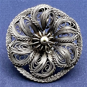 Large silver filigree button.