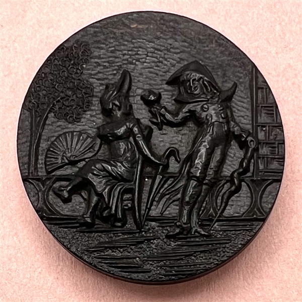 A 19th c. Large molded black horn button of FOP couple.