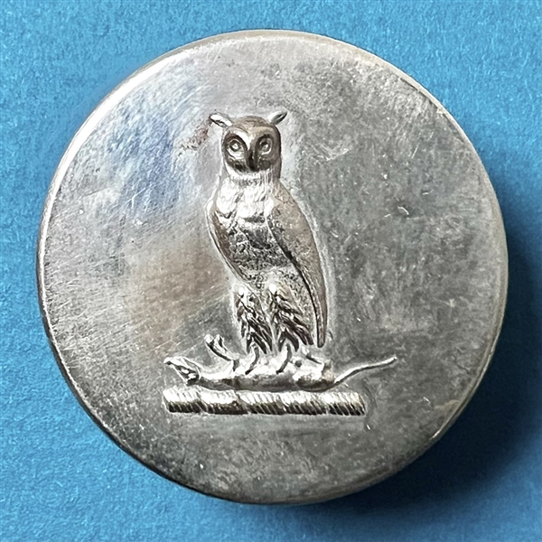 French Livery crest button of an owl with a captured rat.