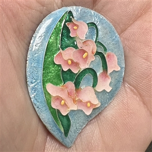 Diana Wieler enamel studio button of pink lily of the valley.
