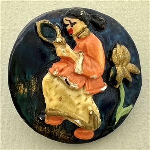 VIntage plaster button of Asian woman with mirror.