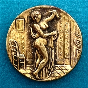 “After the bath” brass button of woman.