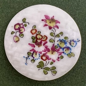 Transitional Mennecy ceramic button of flowers.