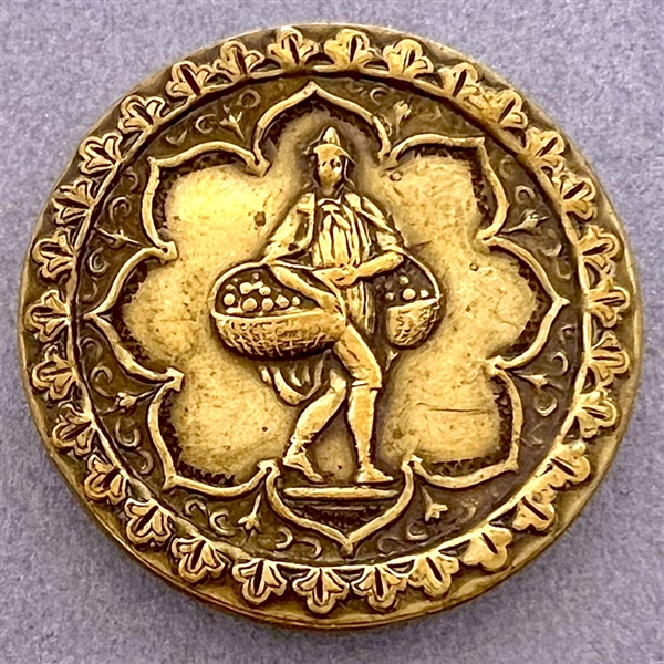 Unusual brass button of a man carrying baskets.