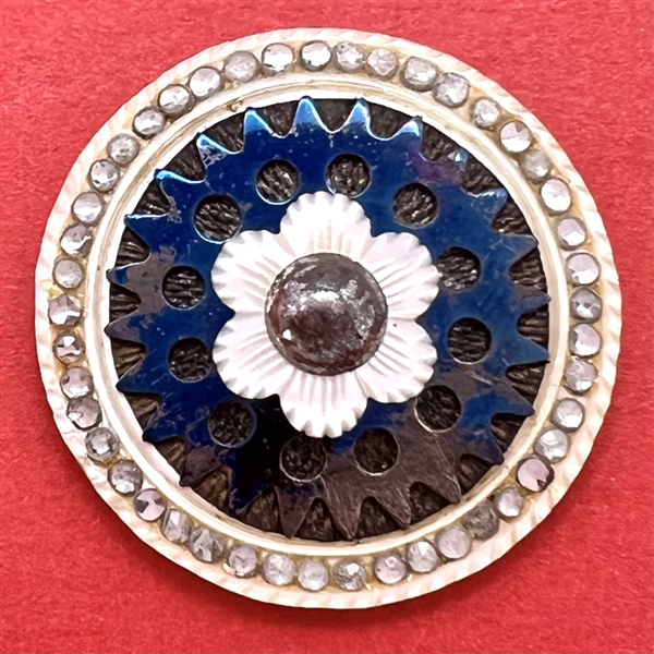 An 18th c. Pearl with blued steel button.