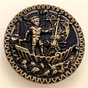 Brass button of a boy in sailboat.