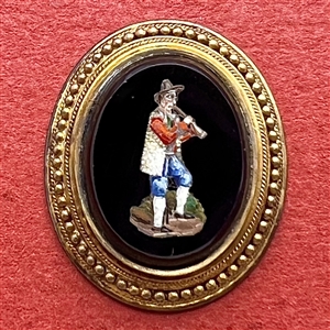 Unique Italian micro mosaic button of a man playing a musical instrument.