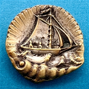 “Sailboat in a Shell” brass button.