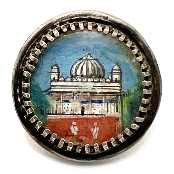 Architectural painting of domed building set in silver button.