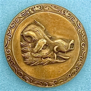 Sporting button with a detailed boar’s head.