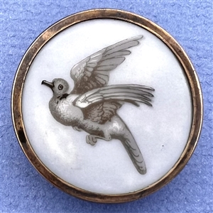 A 19th c. Liverpool transfer button of dove in flight.