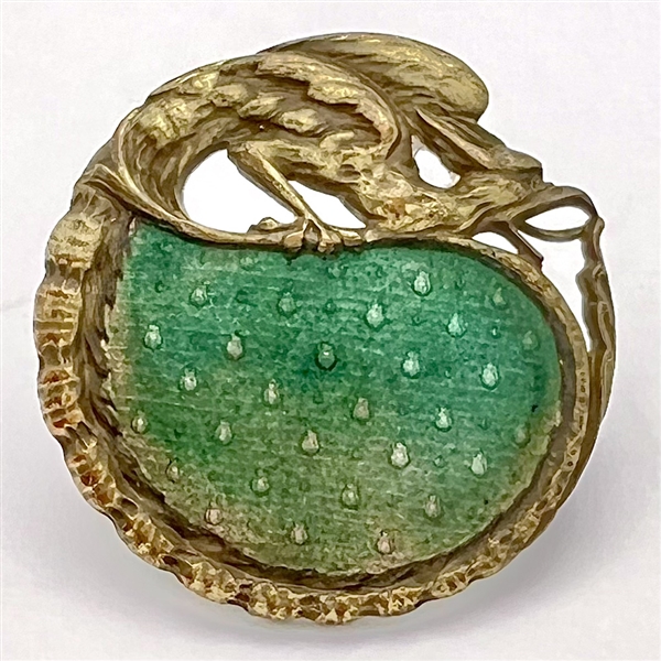 Enamel button with fabulous creature border.