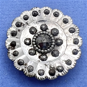 An 18th c. Scalloped steel button.