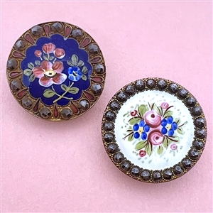 Two 19th c. enamel buttons of flowers with borders of cut-steels.