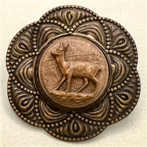 Carved wood deer set in metal button. 