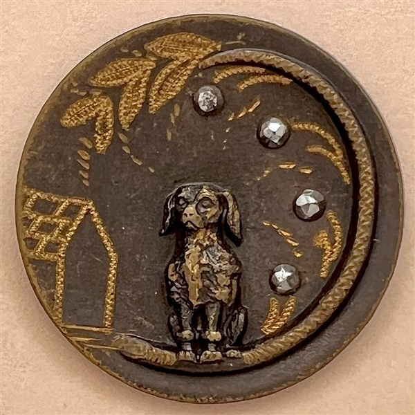 Tinted brass button of a poodle.