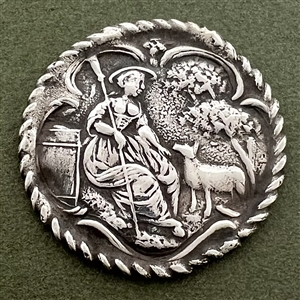 Dutch silver button of Mary and her lamb.