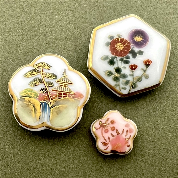 Three lovely Japanese Kutani porcelain  buttons in interesting shapes.