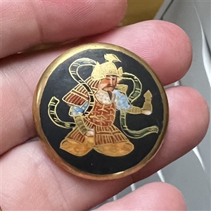 Satsuma button of God of war.