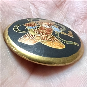 Satsuma button of God of war.