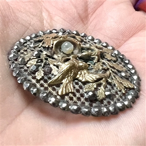 A 19th c. screen back button of bird defending nest with egg from a lizard!